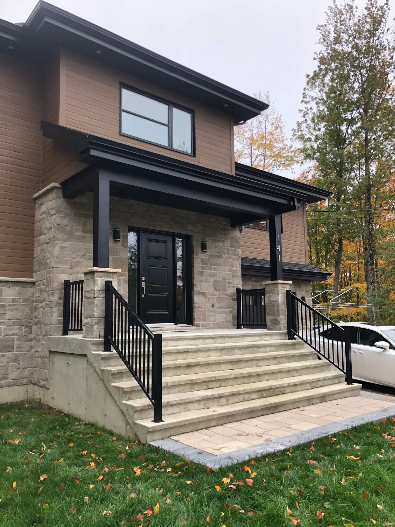 concrete staircase with black aluminum railings 02