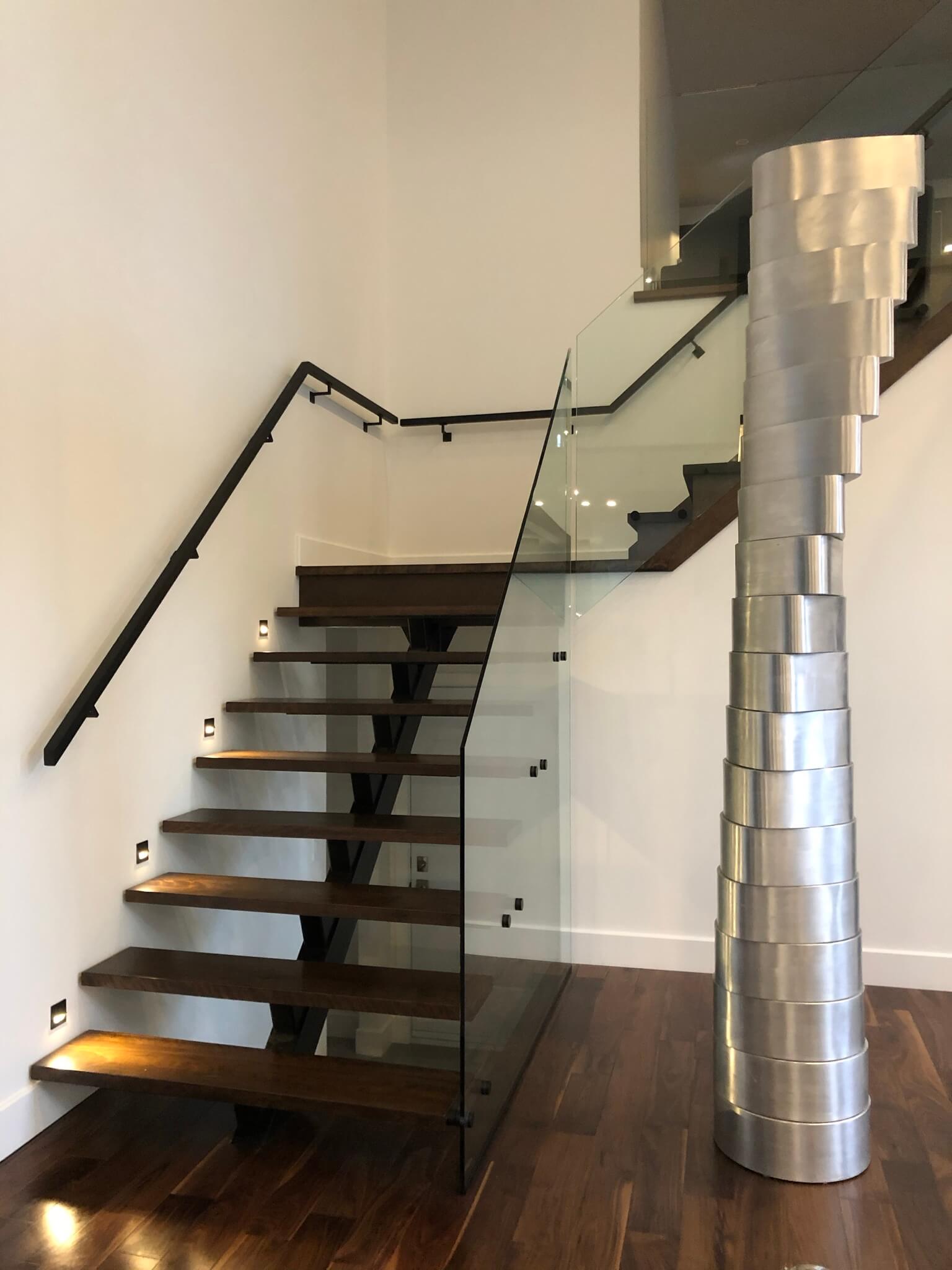 Glass railing staircase with stand-off